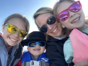 Sarah and her kiddos on Captain Lou's boat!